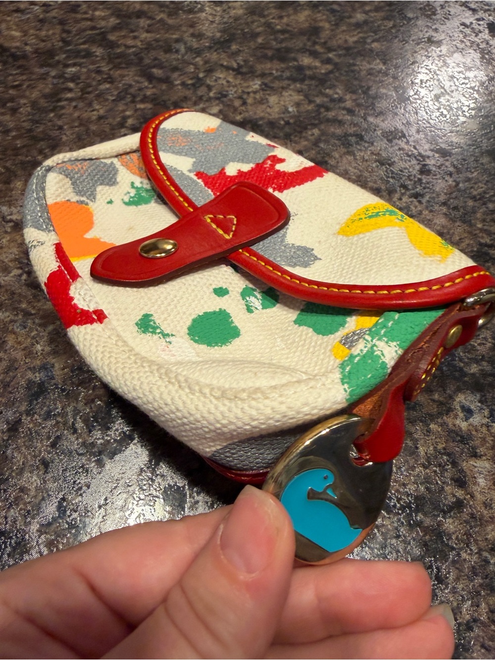 Dooney & Bourke Canvas Mini bag with Red Trim and Multicolor Paint-Splash
